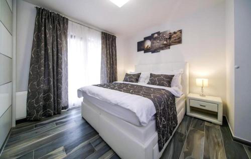 Ένα ή περισσότερα κρεβάτια σε δωμάτιο στο Pet Friendly Home In Seline With Sauna