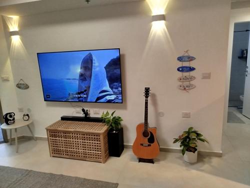 Sunset Suite sea&skyにあるテレビまたはエンターテインメントセンター