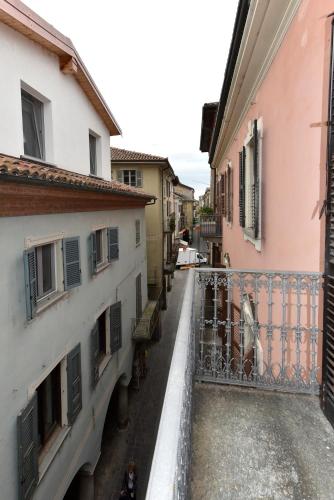 an alley in a town with buildings at Belvedere Campanon in Nizza Monferrato