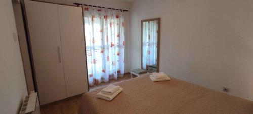 Postel nebo postele na pokoji v ubytování Apartment in Rovinj/Istrien 11560