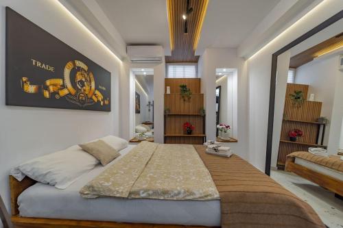 Postel nebo postele na pokoji v ubytování Keti Zemun Spa Apartment