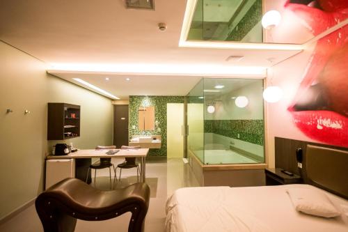 Ένα ή περισσότερα κρεβάτια σε δωμάτιο στο Vitara Motel (Adult Only)