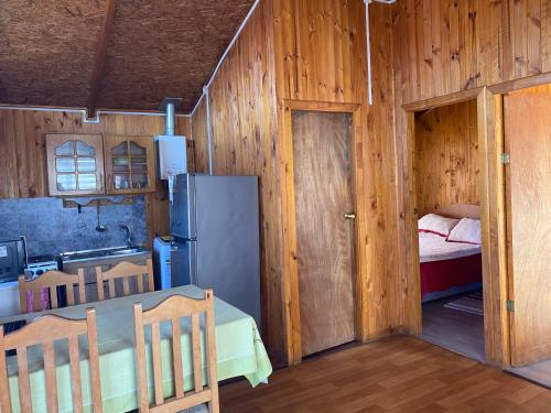 Postel nebo postele na pokoji v ubytování Cabañas la Sebastiana