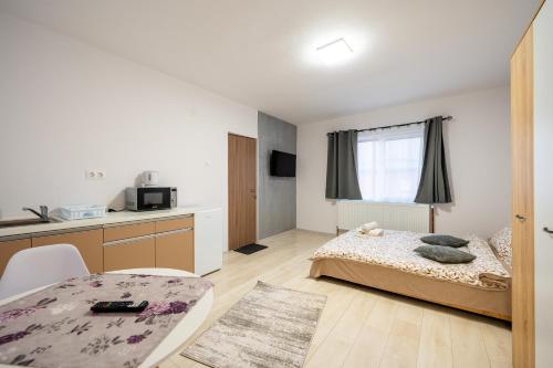 Postel nebo postele na pokoji v ubytování Yvett House