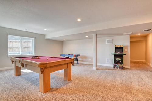 a living room with a pool table in it at Family friendly 5bd3bath 3CarGarage GameRoom in Cimarron Hills