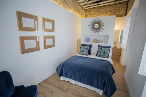 Postel nebo postele na pokoji v ubytování Casa Poeta Cordobés Ricardo Molina