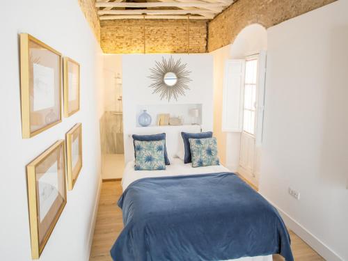 Postel nebo postele na pokoji v ubytování Casa Poeta Cordobés Ricardo Molina