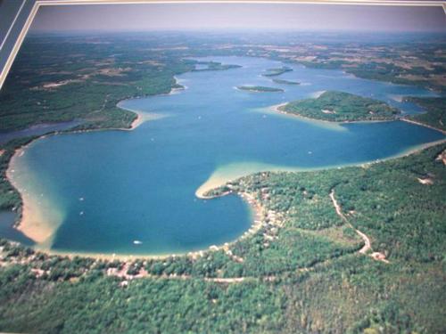 an aerial view of a group of lakes and islands at Splash Landing-Long Lake-Traverse City in Traverse City