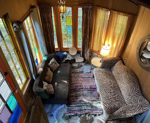 an aerial view of a living room with a zebra print couch at Topanga Wonderland Cottage in Topanga