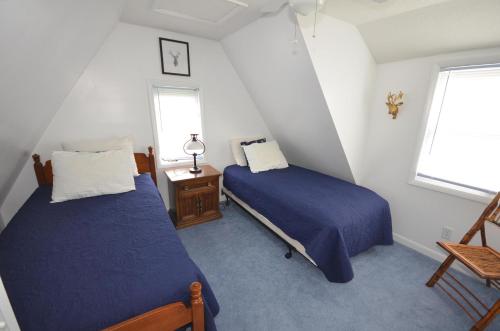 Katil atau katil-katil dalam bilik di Northport Village Hideaway