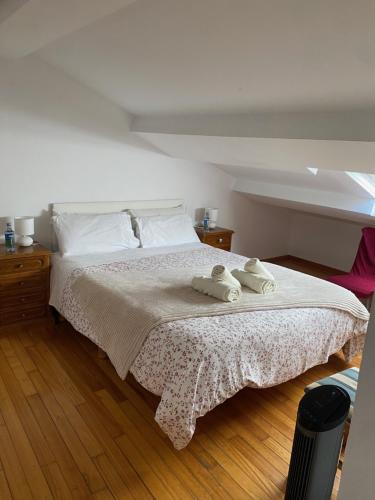 Postel nebo postele na pokoji v ubytování Atico en el casco histórico