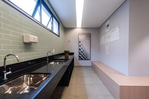 Kuchyň nebo kuchyňský kout v ubytování Kaza Noah Facto Paulista Bela Vista