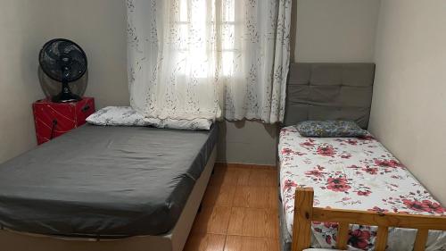 Ένα ή περισσότερα κρεβάτια σε δωμάτιο στο Ranchokomebebedorme