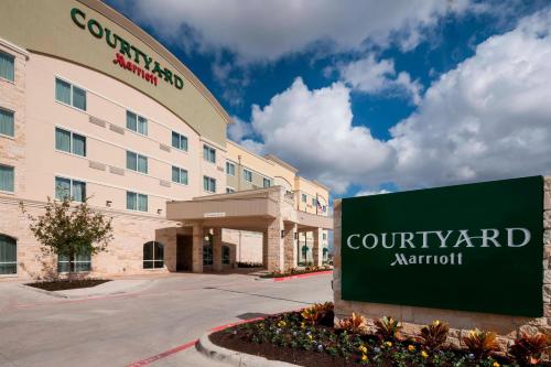 a rendering of a courtyard marriott hotel at Courtyard by Marriott Dallas Plano/Richardson in Plano