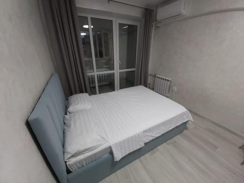Llit o llits en una habitació de Атакент