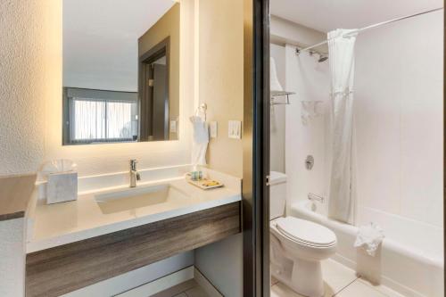 a bathroom with a sink and a toilet at Aiden by Best Western South Reno in Reno
