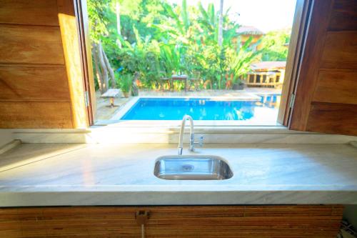 Swimmingpoolen hos eller tæt på Villa Beija Flor