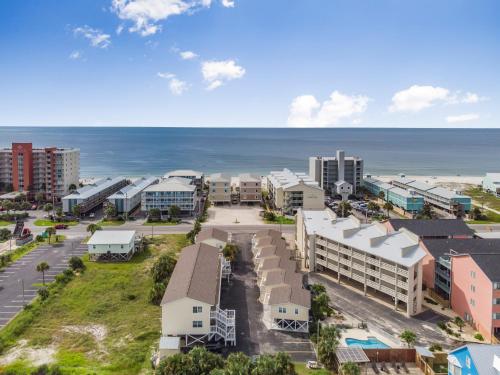 an aerial view of a city with the ocean at Sea & Sun 204 by Vacation Homes Collection in Gulf Shores