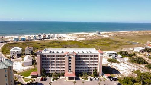an aerial view of a hotel and the beach at The Dunes 507 by Vacation Homes Collection in Gulf Shores