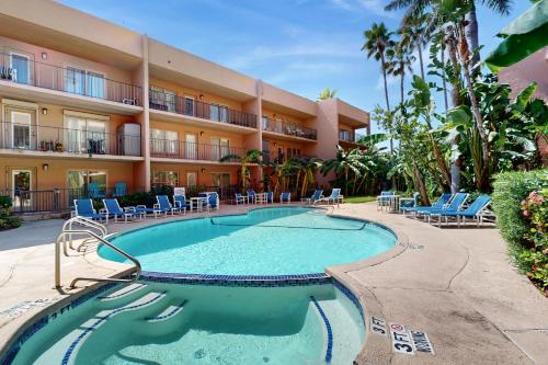 a swimming pool in front of a hotel at Beachview Condominiums #111 in South Padre Island