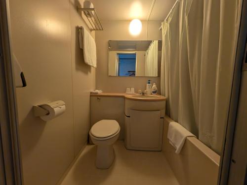 Un baño de プチホテル　MASUYA