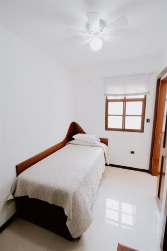 Ένα ή περισσότερα κρεβάτια σε δωμάτιο στο Casa Blan ca Pimentel