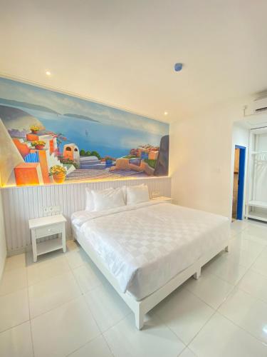 Postel nebo postele na pokoji v ubytování Jungwok Blue Ocean Resort