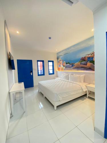 Postel nebo postele na pokoji v ubytování Jungwok Blue Ocean Resort