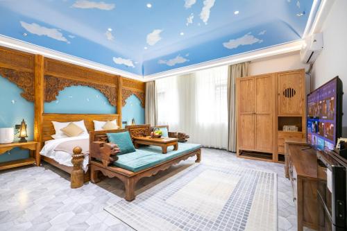 Μια τηλεόραση ή/και κέντρο ψυχαγωγίας στο Lijiang Joland Guest House