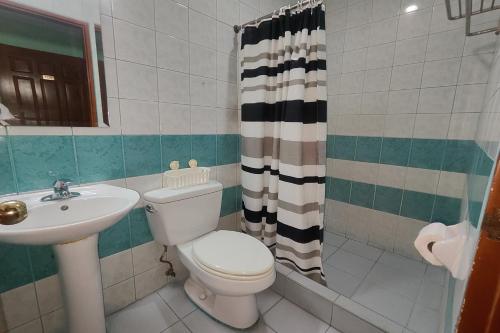 Koupelna v ubytování Oftana Suites Cebu near Oakridge