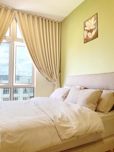 a bedroom with a bed with a large window at The Floral Dawn Anderson in Kampong Simee