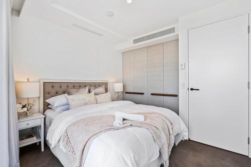 Letto o letti in una camera di Jewel Beachfront Residences