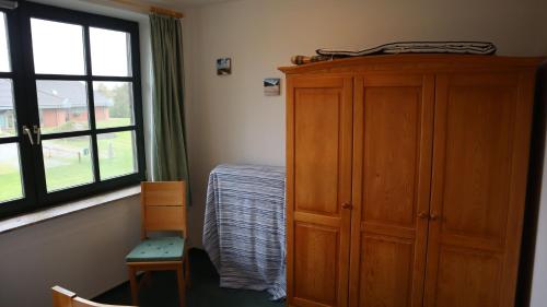 Katil atau katil-katil dalam bilik di Ferienwohnung Kiebitz