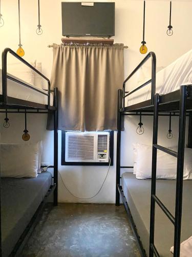 Una cama o camas en una habitación de The Pocket Hotel