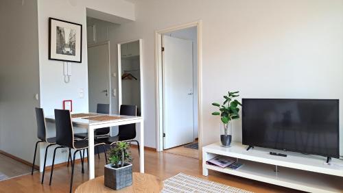 Foto Kotimaailma Apartments - Saunallinen & parvekkeellinen kaksio - Tampellan Esplanadi 5