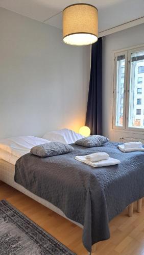 Foto Kotimaailma Apartments - Saunallinen & parvekkeellinen kaksio - Tampellan Esplanadi 2