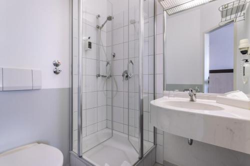 Koupelna v ubytování Hotel Montana