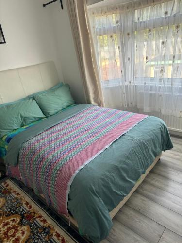 Ένα ή περισσότερα κρεβάτια σε δωμάτιο στο Standard Double Room near OVO Wembley Stadium