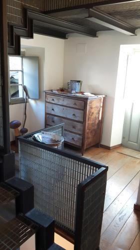 a room with a dresser and a glass table at Coletti Pietro snc in Fabbrica
