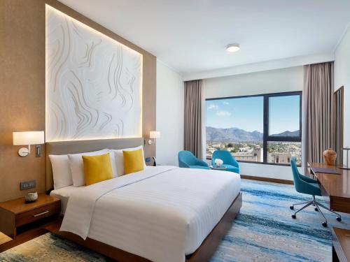 Postel nebo postele na pokoji v ubytování dusitD2 Naseem Resort, Jabal Akhdar, Oman