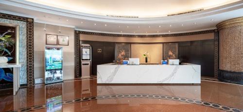 Nápoje v ubytování Suning Universal Hotel ALL-SUITES
