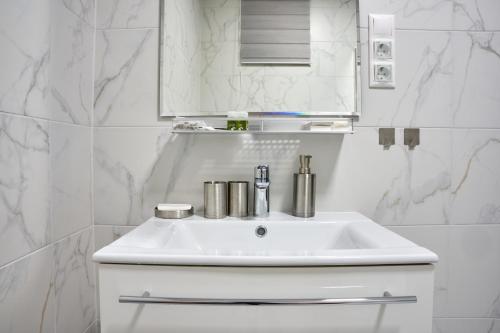 Koupelna v ubytování Béke 10 Apartmanház