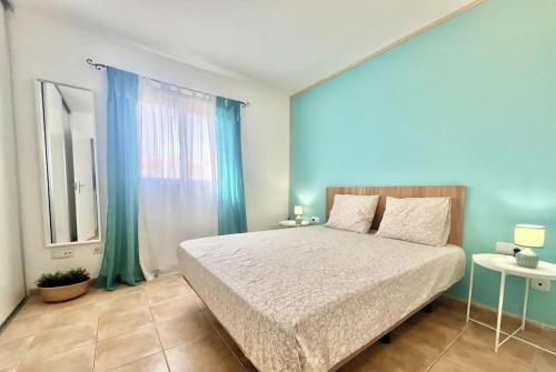 Postel nebo postele na pokoji v ubytování Casa La Macarena