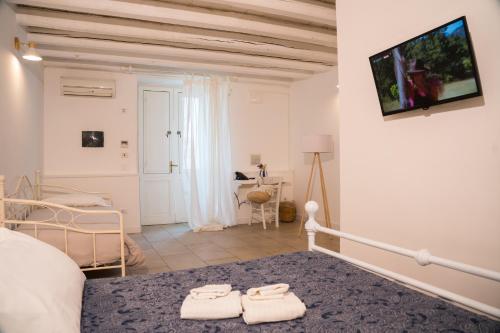 Postel nebo postele na pokoji v ubytování Boutique Hotel Molo S Lucia