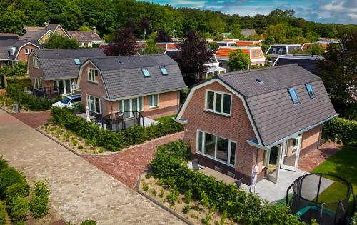 an overhead view of a house in a residential neighborhood at Vakantiepark Duinrust in Noordwijk