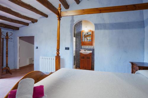 Postel nebo postele na pokoji v ubytování Finca Vitoria