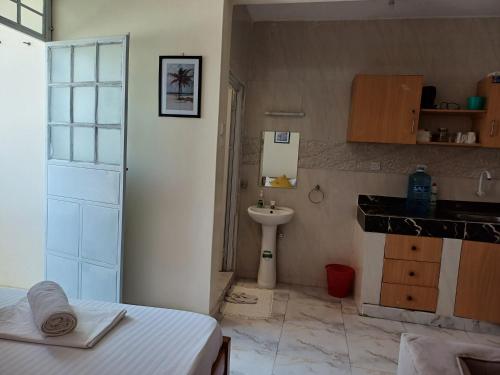 Gambar di galeri bagi Havy Homes Studio Apartment Bamburi di Bamburi