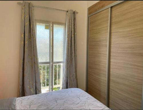 Ένα ή περισσότερα κρεβάτια σε δωμάτιο στο Zen House