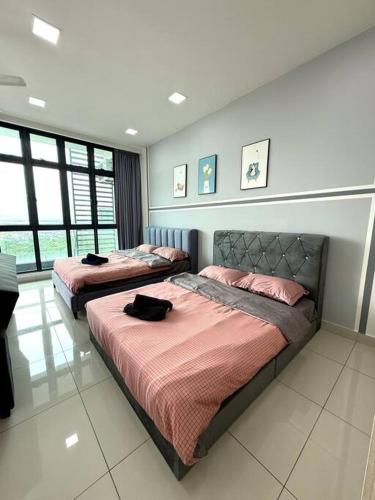 Letto o letti in una camera di B1003 Green Haven Sea View netflix100mbps By STAY