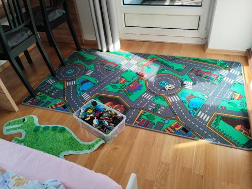 a lego game on a rug on a kitchen floor at Telfer Treasure: unkomplizierter Familienurlaub in Telfs